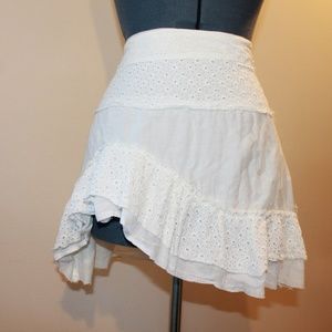 Asymmetrical white linen skirt with sewn details